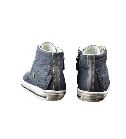 Handmade sneaker grey leather and fashion material.